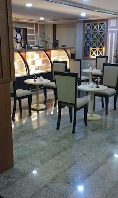 AA Hotel and Suites